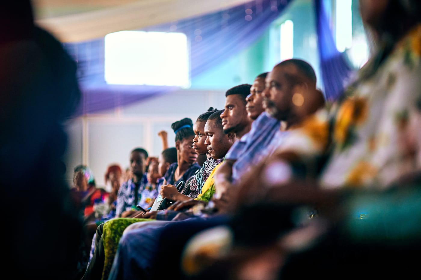 A room of people listening intently at a Terapo session