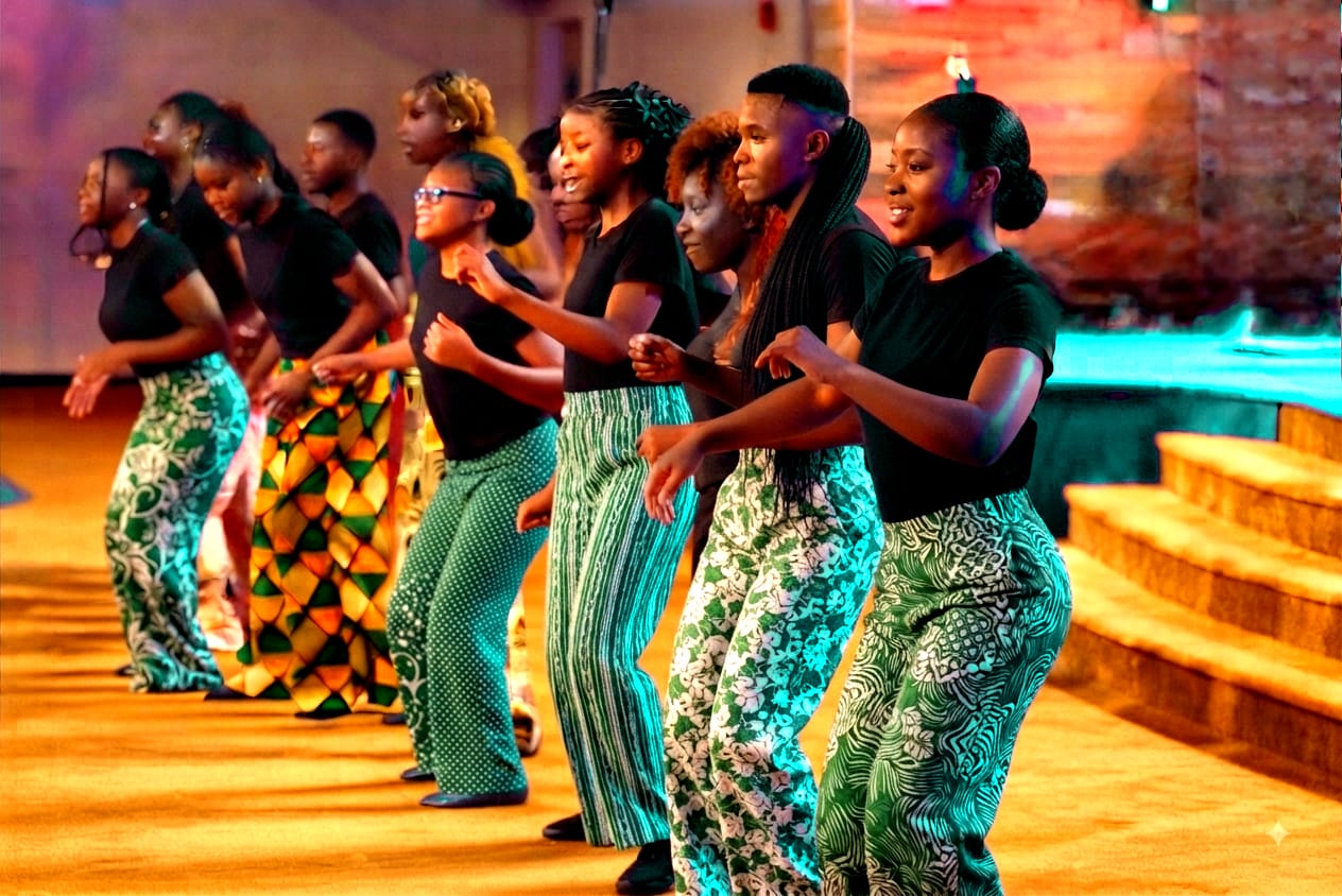 Dancers mid-performance on a Terapo stage